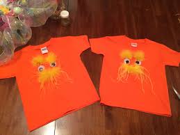 Create a unique library display or photo backdrop with dr. Pin By Heather Shilling On Dr Seuss Big Authors In 2021 Lorax Shirt Diy Diy Shirt The Lorax