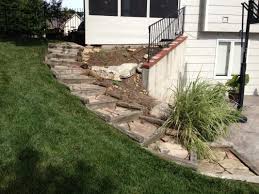 replacing rotten wood retaining wall