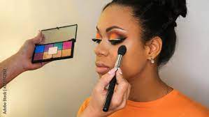 makeup artist working with african