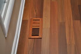 install hardwood floors around heating