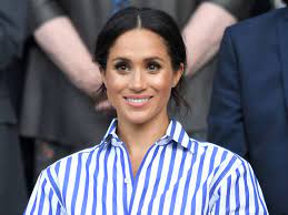 meghan markle had to carry her hat at