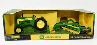 john deere 330 tractor with hay rake