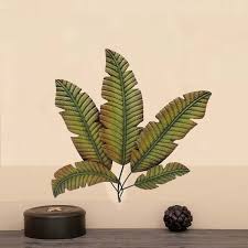 Each botanical fan is made of solid iron with a wavy silhouette at the top, vertical bars in the center, and thick, curved stems. Palm Leaf Hanging Metal Wall Art Decor Green And Brown Overstock 20354517