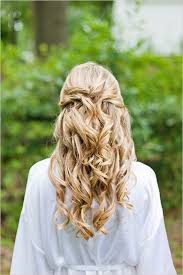 Loosely braid your curls, and then add sparkly hair pins for a curly wedding hairstyle that's equal parts boho and glam. Bridal Hair How To Wear Curls To Your Wedding Topweddingsites Com