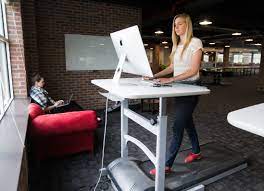 people on treadmill desks perform tasks