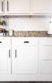 white cabinets and granite countertops