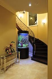 Stunning Cylinder Aquarium with Wrap Around Staircase - Mediterranean -  Entry - Houston - by The Fish Gallery | Houzz gambar png