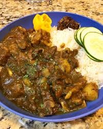 making tasty jamaican curry goat recipe