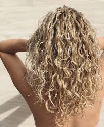 These curly blonde highlights form a dimensional illusion, which boosts the hair texture. 16 Blonde Curly Hair Ideas Trending In 2021