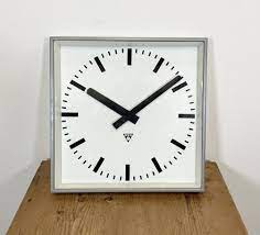 large gray square wall clock from