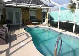 Attached two car garage, storage room, detached storage building. Panama City Beach House Rental 3 Bedroom 2 Bath Home Heated Pool Pet Friendly