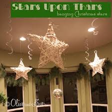 If you have a ladder that is taking up space, here is a simple project that will allow you to hang it from the ceiling.i have a full written tutorial posted. Olive And Love Stars Upon Thars Christmas Ceiling Decorations Christmas Hanging Decorations Hang From Ceiling Decor