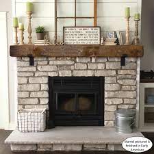 rustic fireplace mantel with metal
