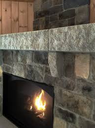 The Acadia Fireplace Features Ashlar
