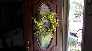 how to hang a wreath on a glass door