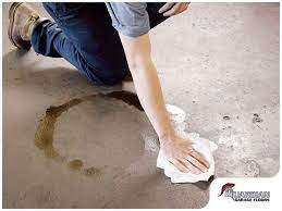 remove oil stains on your garage floor