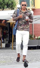 Memphis depay about his horror youth. Memphis Depay Puffs On A Cigar As He Strolls Alongside Italian Riviera With Fiancee Lori Harvey
