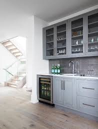 gray wet bar cabinetry with gray
