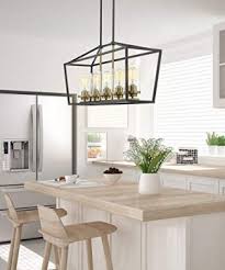 Check out our kitchen island light selection for the very best in unique or custom, handmade pieces from our chandeliers & pendant lights shops. Emliviar Modern 5 Light Kitchen Island Pendant Light Fixture Linear Pendant Lighting Black And Gold Finish With Clear Farmhouse Goals