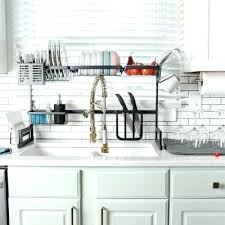 We spoke to someone at home depot and two people who've gone through the process to find out everything you need to know about buying kitchen cabinets credit: Dish Racks Kitchen Sink Organizers Home Depot Drying Rack Graspsense Com