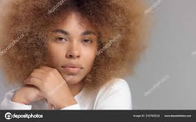 mixed race black woman with big afro
