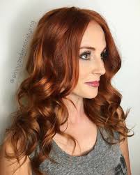 Tan skin tones look great with cherry red or vibrant crimson, as it enhances one's natural glow, explains tang. Red Hair Hair Color Auburn Red Hair Olive Skin Skin Tone Hair Color