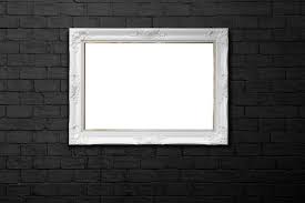 White Frame On Black Brick Wall