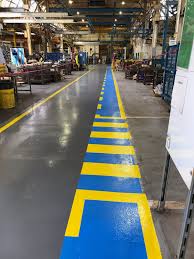 paint vs tape for industrial floor marking