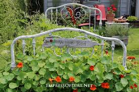 real bed frame into a flower garden bed