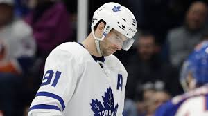 He lost his balance and fell backwards, his head made contact with perry's knee causing a serious head/neck injury. The Worst Possible Homecoming For John Tavares Abc7 New York