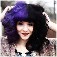 This colorful hairstyle is fun for just about any girl: Purple And Black Half And Half Hair Jpg 600 600 Split Dyed Hair Half And Half Hair Hair Color