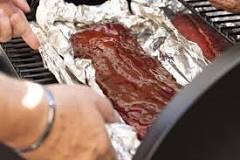 Do ribs cook faster in foil?