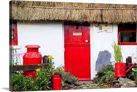 Traditional Irish Cottage With A Red