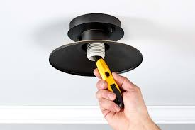 replace a bulb socket in a light fixture