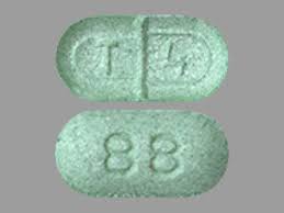 t 4 88 pill green capsule oblong pill