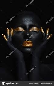 black skin color body art gold makeup