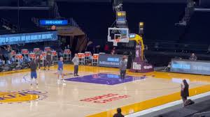The background consists of the gold ball with the map. Video Warriors Superstar Steph Curry Seen Effortlessly Drilling Shots From Lakers Logo Before Tipoff Lakers Daily