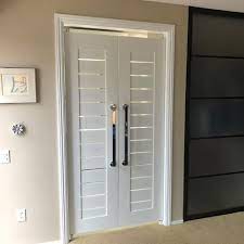 The wide louvers give the doors a clean, modern style that will complement any decor. 37 Custom Swinging Doors Ideas Swinging Doors Doors Cafe Door