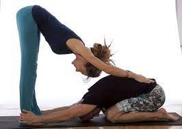 This easy yoga pose for two stretches the hamstrings. Pin By Victoria Velting On Yoga Couples Yoga Poses Yoga Challenge Poses Couples Yoga