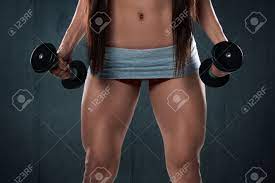 Sexy Athletic Woman Showing Muscular Legs. Fitness Girl With Dumbbells.  Stock Photo, Picture and Royalty Free Image. Image 48135364.