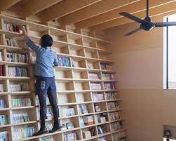 Japanese Home Features A Bookshelf Wall