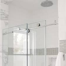 Of all the shower stall designs, this one is the most unique with its barn door closure and shiplap walls. Glass Sliding Shower Doors Design Ideas