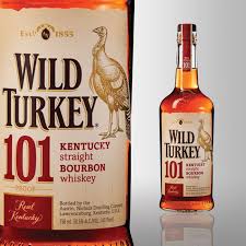 In a small bowl, froth an egg white and add a dollop—the size of a bar spoon or teaspoon—to the mixture. Wild Turkey Bourbon Whiskey