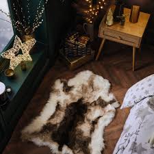 aldi is selling a faux reindeer rug for