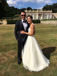 The pictures showed the couple's new wedding bands, a still of them cuddling, and a portrait of portner: Who Is Emma Willis Married To And When Was Her Wedding