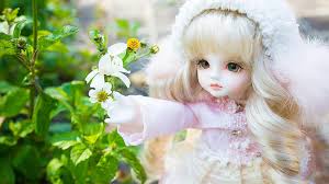 wearing white pink dress and cap doll