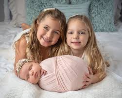 sister newborn photographs one big