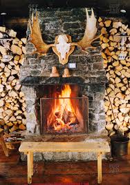 Antlers Hanging Over A Fireplace Stock