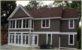 gray exterior paint with brown roof