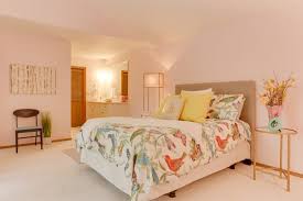 pastel pink guest room eclectic bedroom